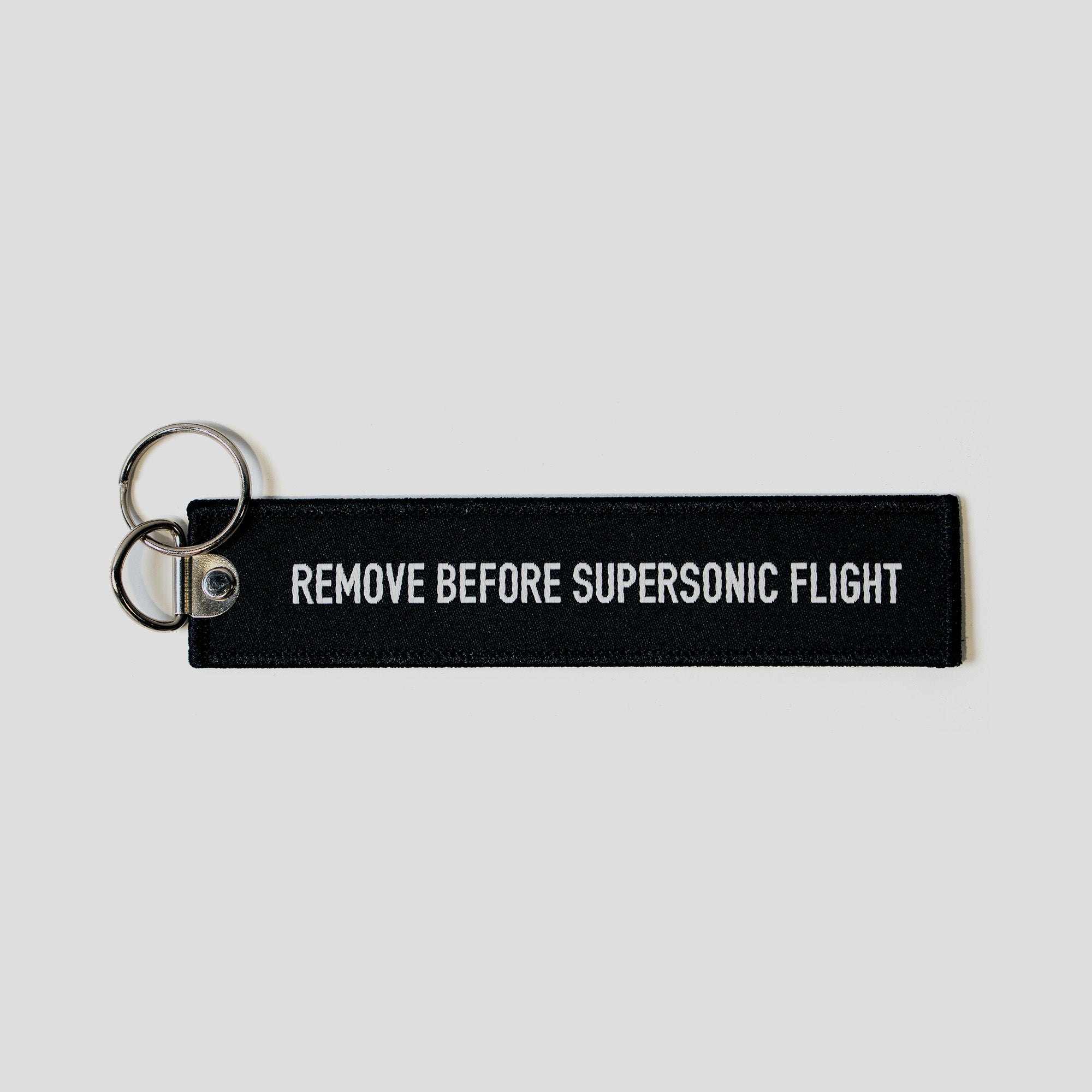 Remove Before Supersonic Flight Keychain